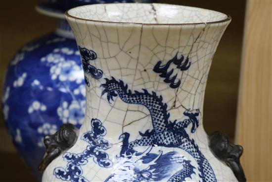 A large 19th century Chinese blue and white vase and cover and a crackle glaze dragon vase tallest 42cm